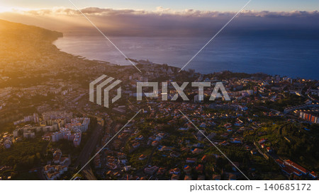 Aerial view of Funchal, Madeira, with harbor and cruise pier at sunset Aerial view of Funchal, Madeira, with harbor and cruise pier at sunset 140685172