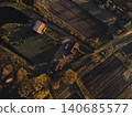 Aerial View of Farmstead and Fields at Sunrise or Sunset 140685577
