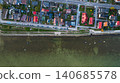 Aerial View of Waterfront Residential Area with Colorful Houses 140685578