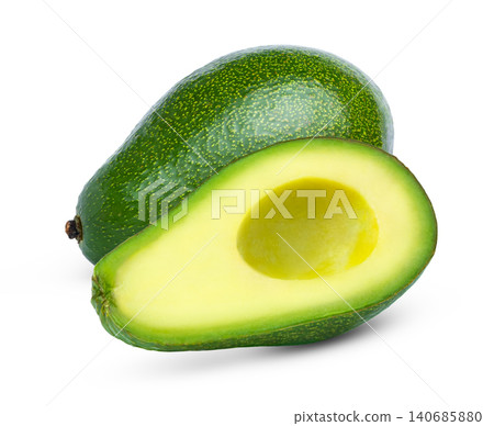 Green fresh Fuerte avocado and cuti in half of avocado withou seed isolated. Avocados with clipping path. Green fresh Fuerte avocado and cuti in half of avocado withou seed isolated. Avocados with clipping path. 140685880