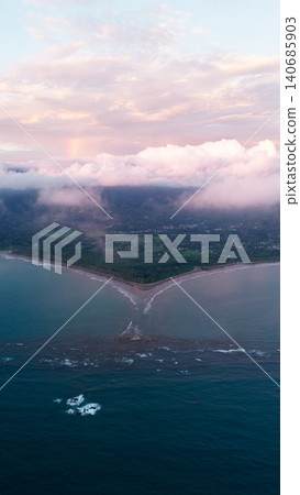 Uvita Whale Tail beach aerial view at sunset 140685903