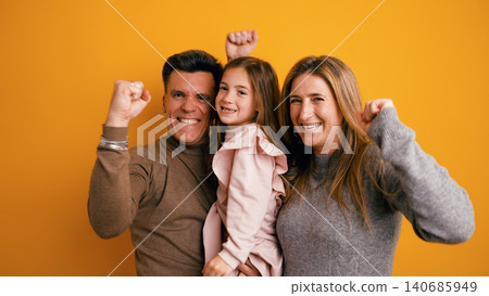 Happy family celebrating success and victory together Happy family celebrating success and victory together 140685949