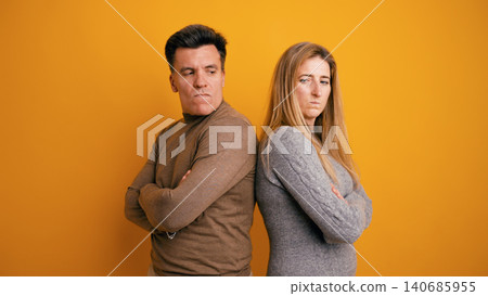 Couple feeling conflict, resentment, and ignoring each other Couple feeling conflict, resentment, and ignoring each other 140685955