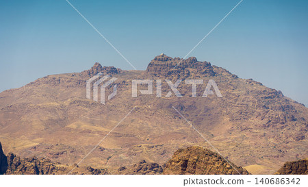 Panoramic aerial view of Jabal Harun mountain with the tomb of Saint Aaron on top, Wadi Rum desert, Jordan Panoramic aerial view of Jabal Harun mountain with the tomb of Saint Aaron on top, Wadi Rum desert, Jordan 140686342