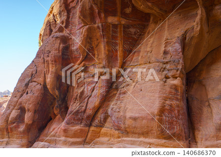 Panoramic view of Siq Gorge canyon cliffs and rocks at daytime, Petra, Wadi Musa, Jordan Panoramic view of Siq Gorge canyon cliffs and rocks at daytime, Petra, Wadi Musa, Jordan 140686370