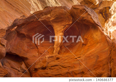 Petra, Wadi Musa, Jordan, Siq Gorge canyon, panoramic view of interesting-looking rock, bottom up view. Petra, Wadi Musa, Jordan, Siq Gorge canyon, panoramic view of interesting-looking rock, bottom up view. 140686377