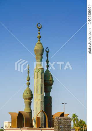 Jeddah, Saudi Arabia- Mar 08 2023, Minaret tops at Douar Kharjiya Roundabout - Al Bayya Square, at daytime, Jeddah, Saudi Arabia  140686604