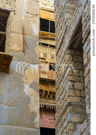 Jeddah, Saudi Arabia, a view of narrow passage between houses, alley in the old city of Jeddah Jeddah, Saudi Arabia, a view of narrow passage between houses, alley in the old city of Jeddah 140686646