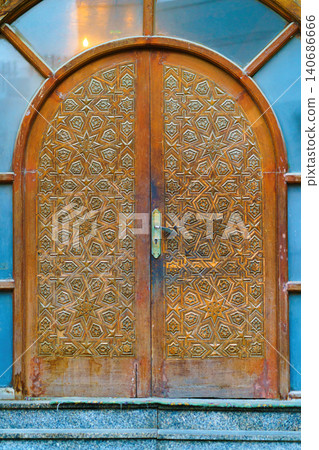 View of curious looking door in old town of Jeddah, Saudi Arabia, at daytime View of curious looking door in old town of Jeddah, Saudi Arabia, at daytime 140686666