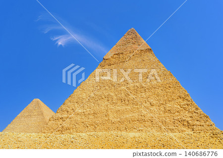 Giza, Egypt, Panoramic view of two of great Pyramids, Cheops and Khafren, at daytime Giza, Egypt, Panoramic view of two of great Pyramids, Cheops and Khafren, at daytime 140686776