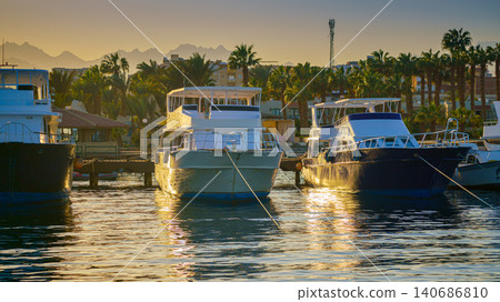 Hurghada, Egypt - Mar 12 2023, a panoramic view of boats at marina near Sharm El Sheikh, at evening, Hurghada, Egypt Hurghada, Egypt - Mar 12 2023, a panoramic view of boats at marina near Sharm El Sheikh, at evening, Hurghada, Egypt 140686810