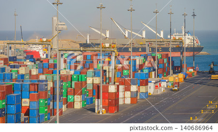 Ain Sokhna, Egypt - Mar 18 2023, Aerial panoramic view of the port with containers, cranes and ships, Ain Sokhna, Egypt Ain Sokhna, Egypt - Mar 18 2023, Aerial panoramic view of the port with containers, cranes and ships, Ain Sokhna, Egypt 140686964