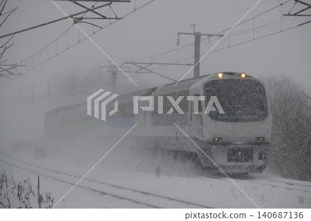 The North Rainbow Express running on the Chitose Line The North Rainbow Express running on the Chitose Line 140687136
