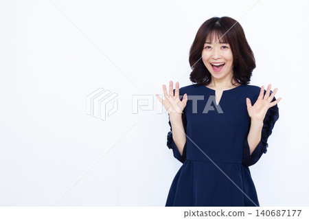 Smiling and surprised woman Smiling and surprised woman 140687177