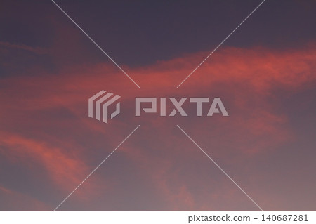 Dramatic red and orange sky and clouds abstract background. Red-orange clouds on sunset sky. Warm weather background. Art picture of sky at dusk Dramatic red and orange sky and clouds abstract background. Red-orange clouds on sunset sky. Warm weather background. Art picture of sky at dusk 140687281