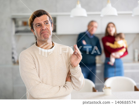 Man and woman quarreling with man Man and woman quarreling with man 140688574