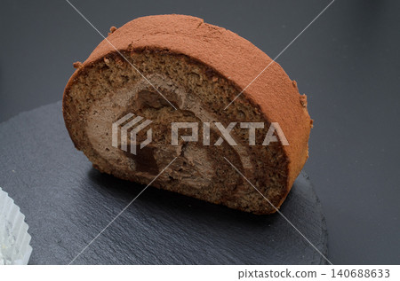 Take a break with a raw chocolate roll cake. Take a break with a raw chocolate roll cake. 140688633