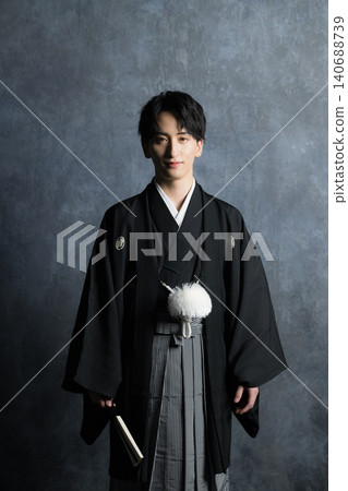 A man in a hakama with a crest A man in a hakama with a crest 140688739