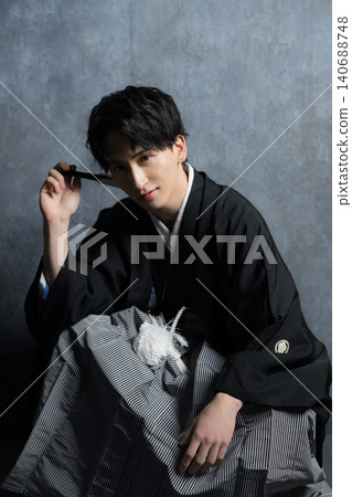 A man in a hakama with a crest A man in a hakama with a crest 140688748