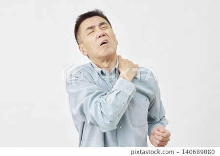 A man with stiff shoulders on a white background A man with stiff shoulders on a white background 140689080