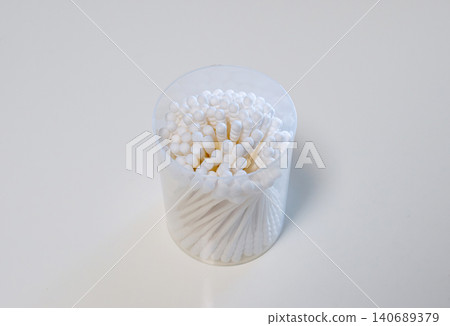 Cotton swabs in a container 140689379