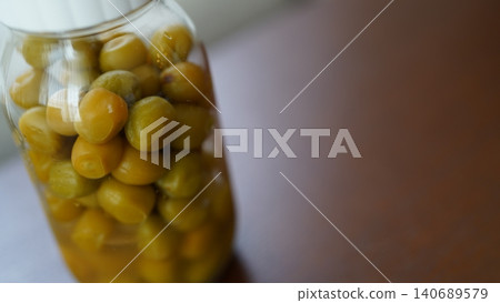 Small pickled green plums Small pickled green plums 140689579