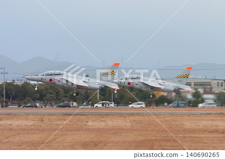 Japan Air Self-Defense Force T-4 trainer aircraft taking off in formation Japan Air Self-Defense Force T-4 trainer aircraft taking off in formation 140690265