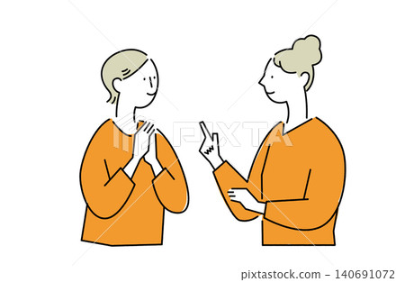 Women chatting with smiles on their faces Women chatting with smiles on their faces 140691072