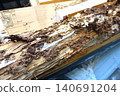 Pillars of a house damaged by termites 140691204