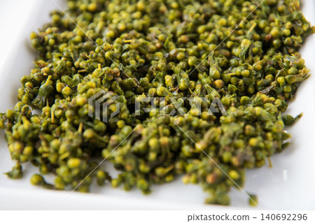 Pickled shiso seeds in soy sauce (up close) Pickled shiso seeds in soy sauce (up close) 140692296