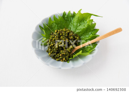 Close-up of pickled shiso seeds in soy sauce Close-up of pickled shiso seeds in soy sauce 140692308