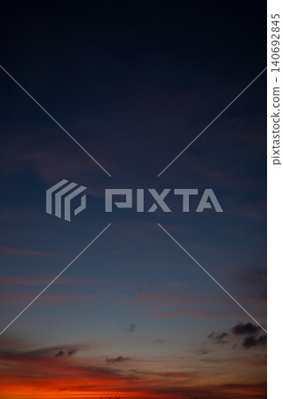 Clouds fill the Bali sky at sunset, showing vibrant colors Clouds fill the Bali sky at sunset, showing vibrant colors 140692845