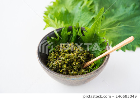 Pickled shiso seeds in soy sauce in a bowl Pickled shiso seeds in soy sauce in a bowl 140693049