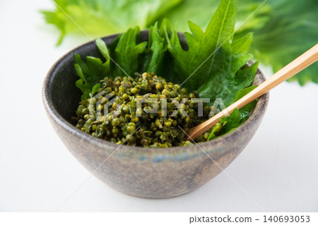 Pickled shiso seeds in soy sauce in a bowl Pickled shiso seeds in soy sauce in a bowl 140693053