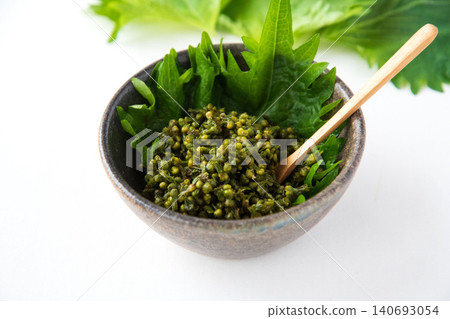 Pickled shiso seeds in soy sauce in a bowl Pickled shiso seeds in soy sauce in a bowl 140693054
