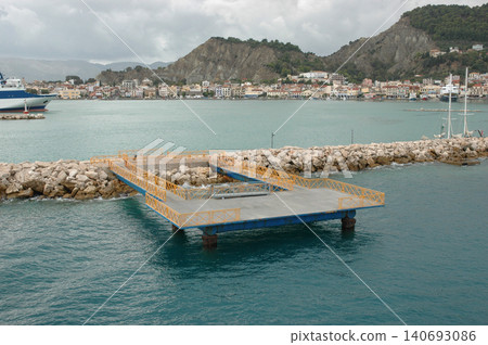 Floating Pier with Yellow Railings in Zakynthos Harbor Floating Pier with Yellow Railings in Zakynthos Harbor 140693086