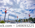 Crane at a construction site in the suburbs [Construction image] 140693225