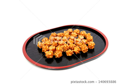 Sugar-coated rice crackers, caramel flavored, arare [white background, cutout] 140693886