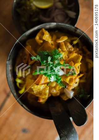 Northern Thai food (Khao Soi), Spicy curry noodles soup Northern Thai food (Khao Soi), Spicy curry noodles soup 140695178