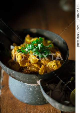 Northern Thai food (Khao Soi), Spicy curry noodles soup Northern Thai food (Khao Soi), Spicy curry noodles soup 140695180