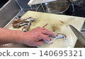 Squid cleaning preparation 140695321