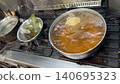 Simmering Japanese dashi 140695323