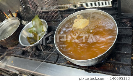 Simmering Japanese dashi Simmering Japanese dashi 140695323