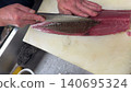 Tuna block cutting 140695324