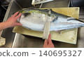 Yellowtail skin removal 140695327