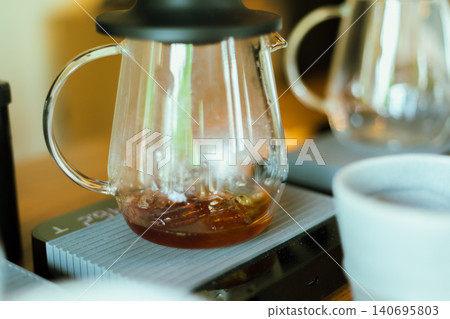 Barista making drip coffee. 140695803