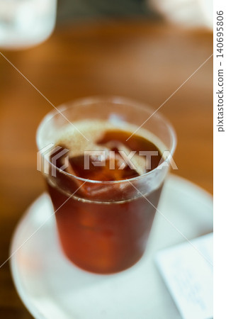 black drip coffee in glass cup. black drip coffee in glass cup. 140695806