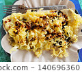 Tempe mendoan is freshly fried and served on a plate ready to eat. 140696360