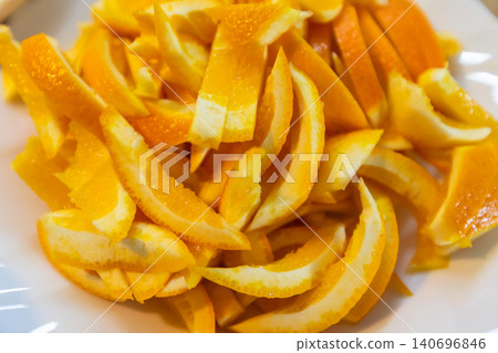 Top view of orange peels for candied fruit making Top view of orange peels for candied fruit making 140696846
