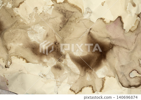 Vintage and old looking coffee cup stain background  with a tea retro texture grunge paper for drawing. ancient book page. 140696874